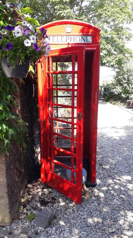 Hank Holiday Cottage De Garage Inn מראה חיצוני תמונה